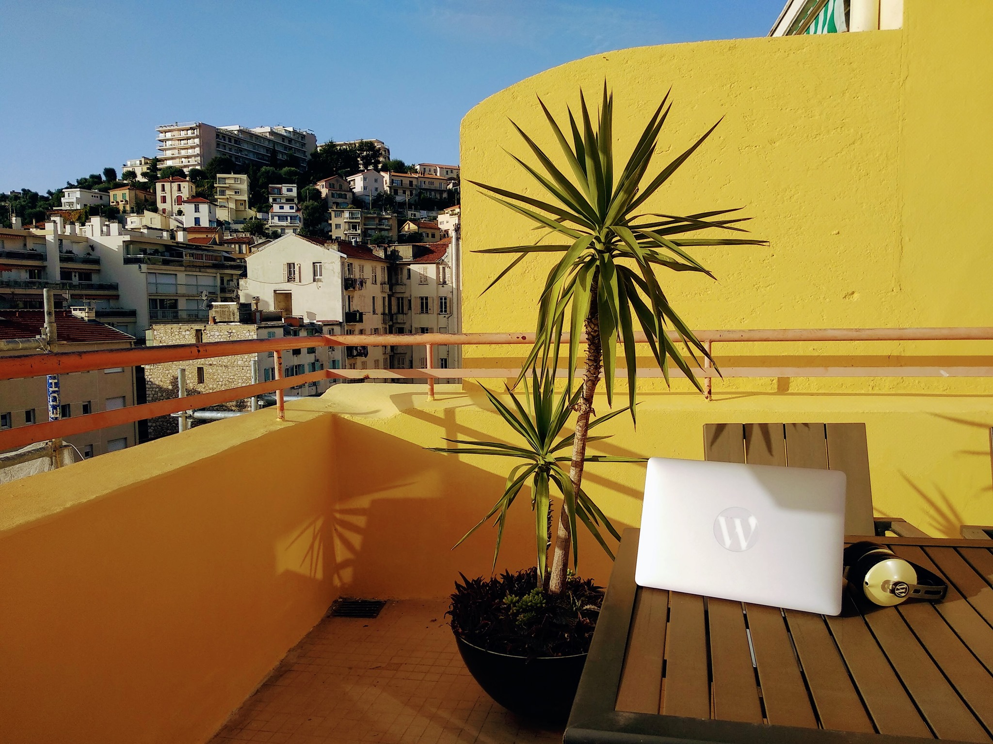 working outside on a balcony