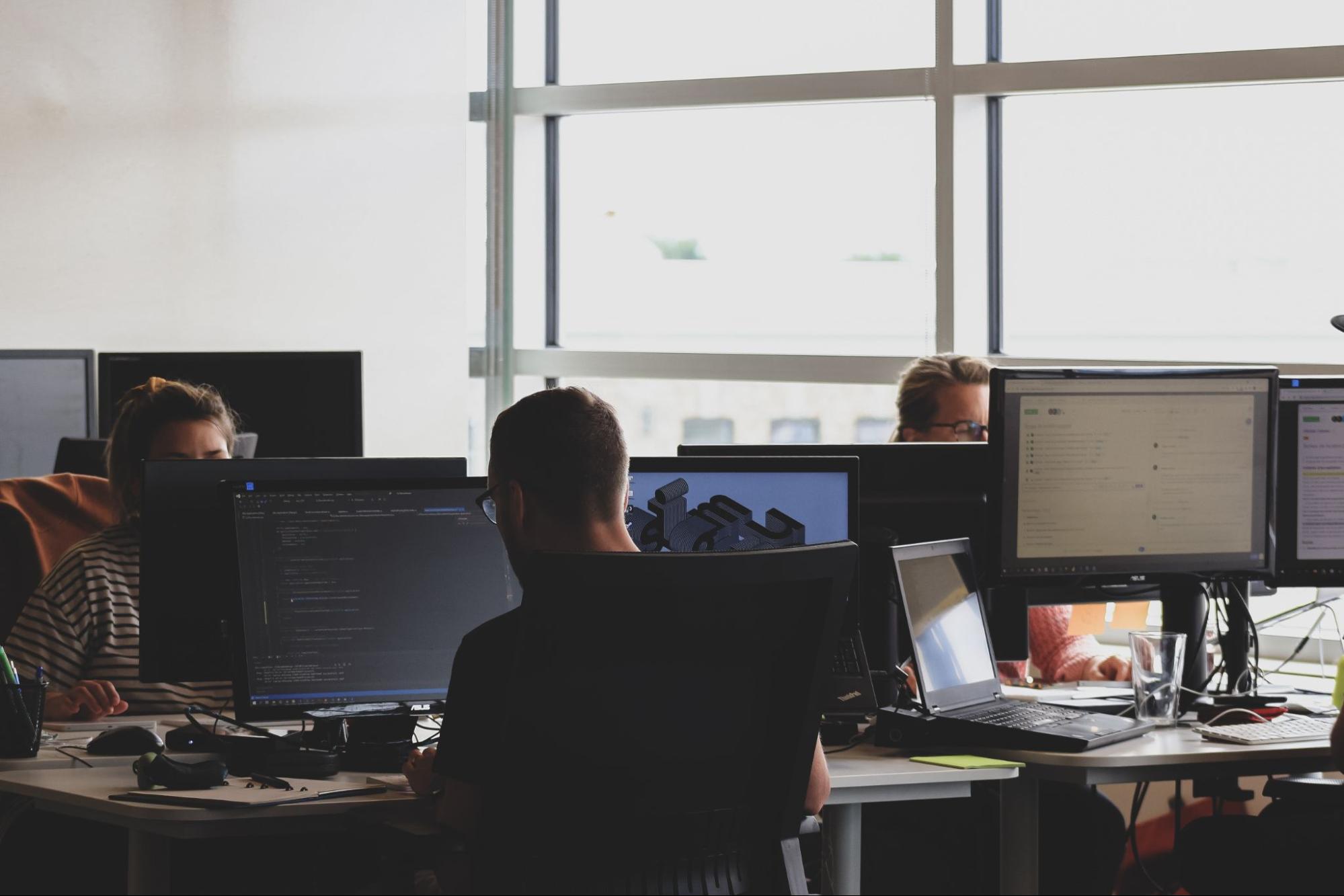 development team working on computers