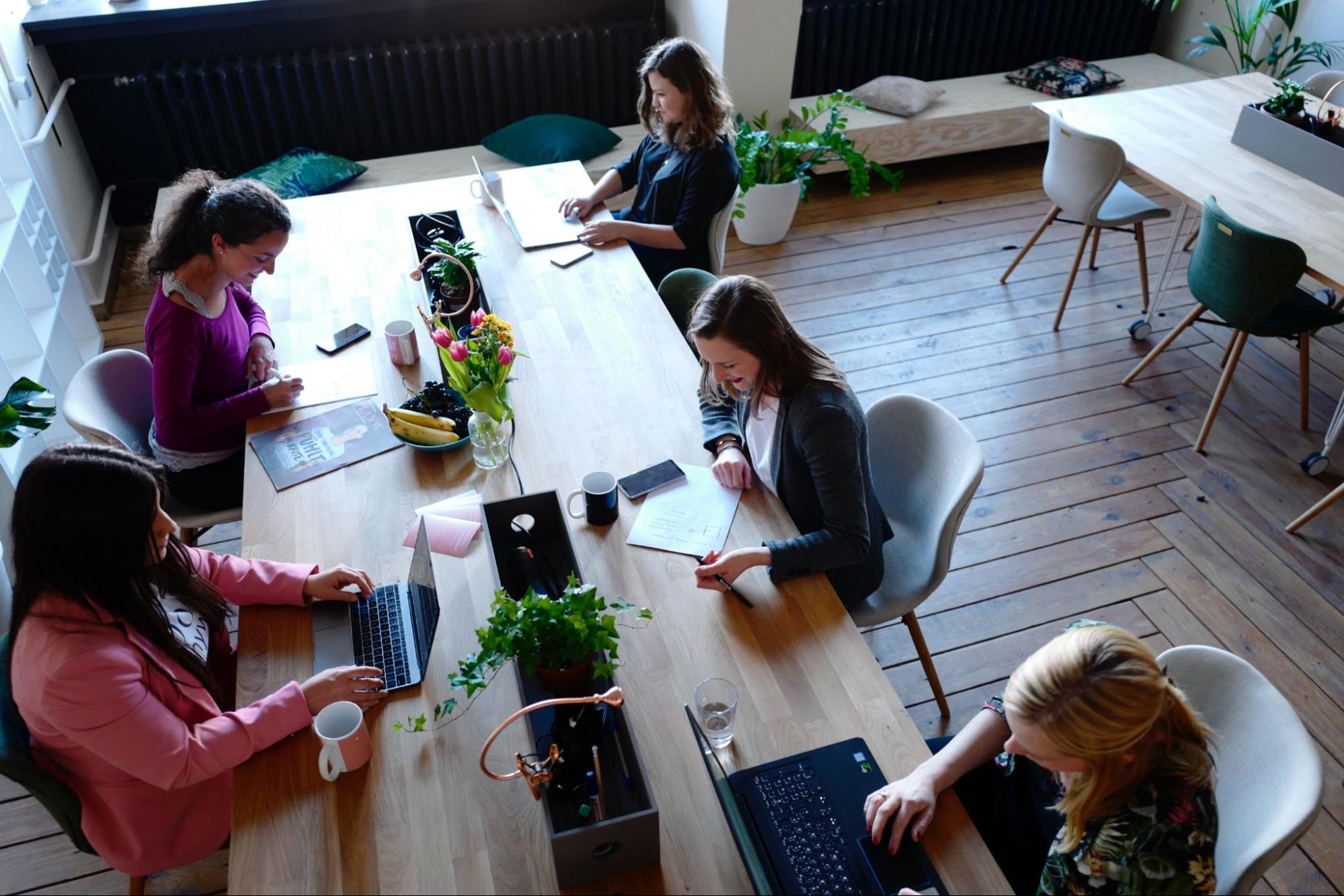 team working around a large table