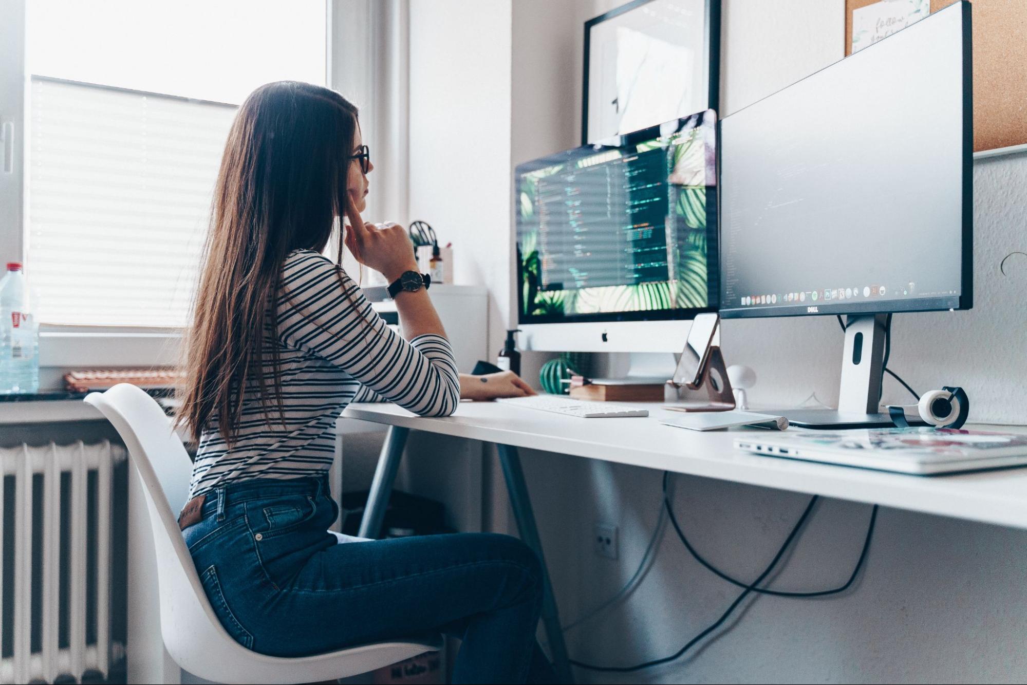 woman working at a desktop computer