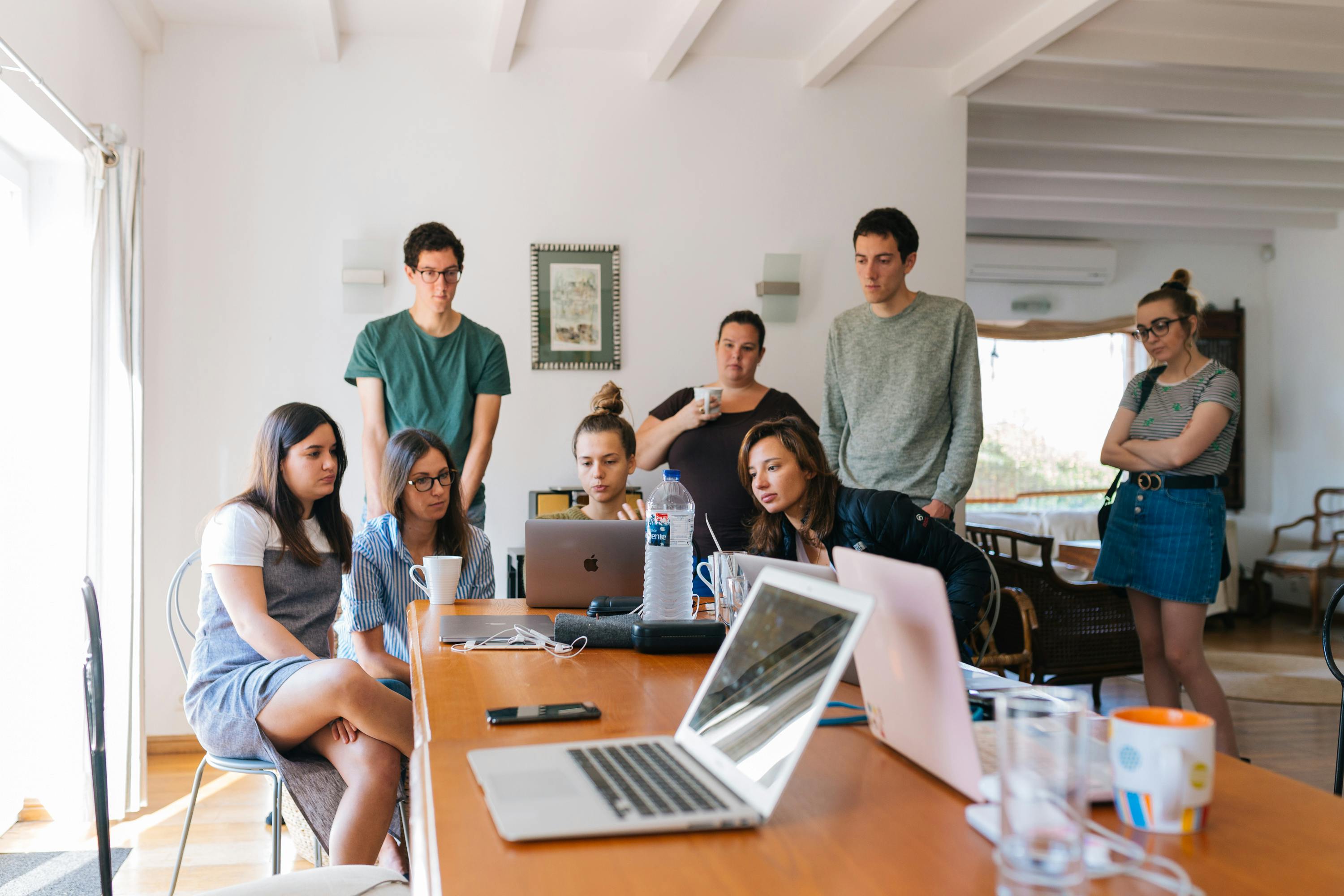 group of people working in an office