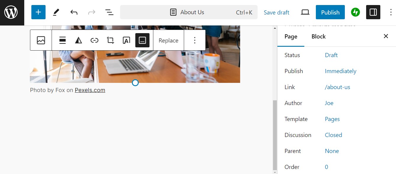 Gutenberg page editor for new page on a WordPress website with image block and caption identifying image source.