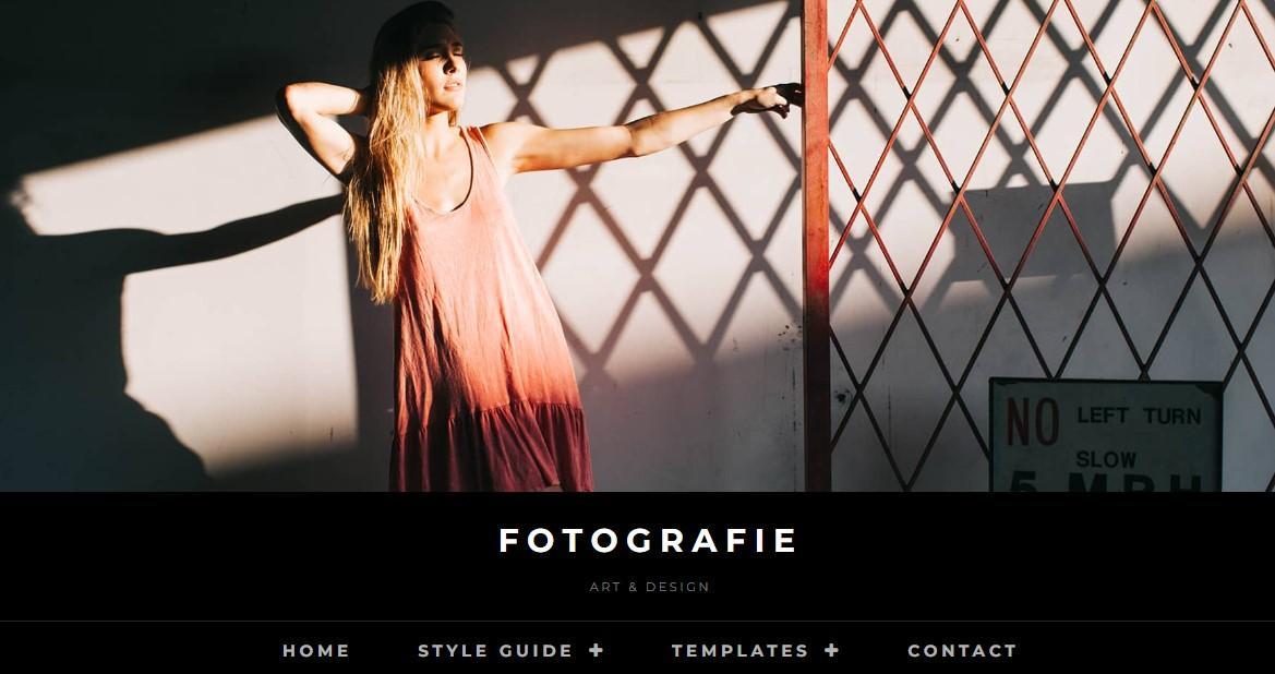 Example of a site built with the Fotografie WordPress theme with a full screen hero section including a title and background image.