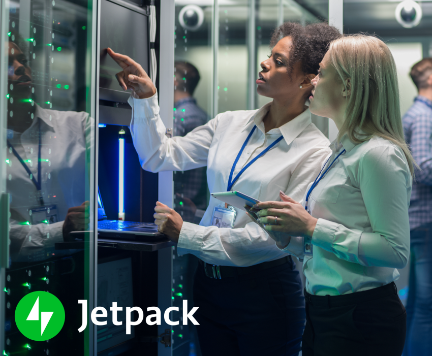 two hosting experts examining servers