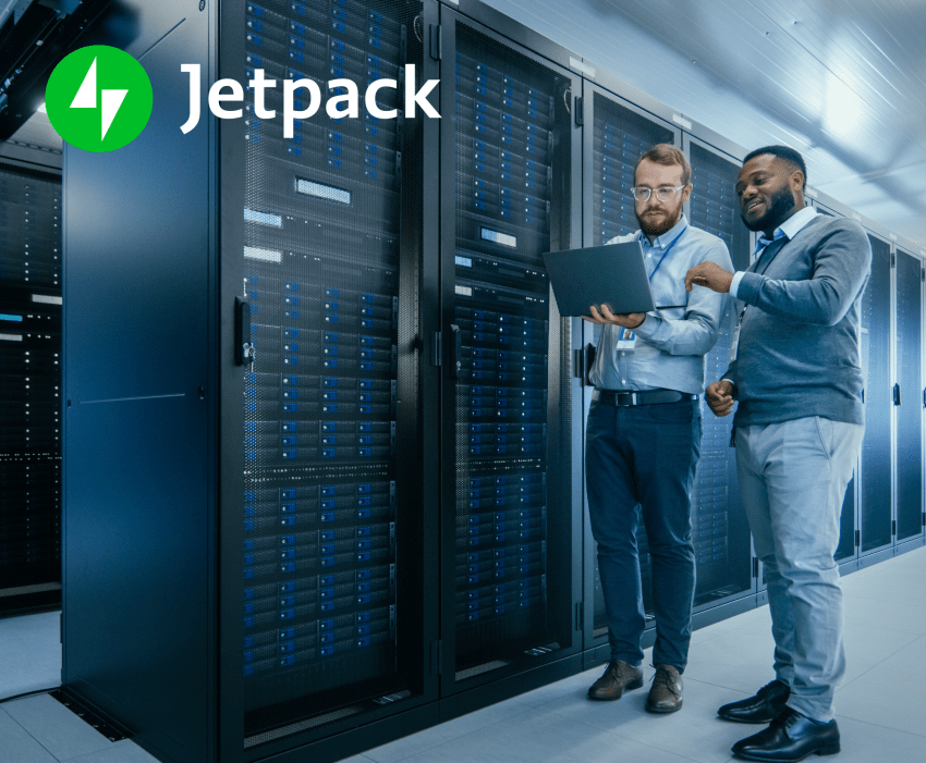 two people working in a server room