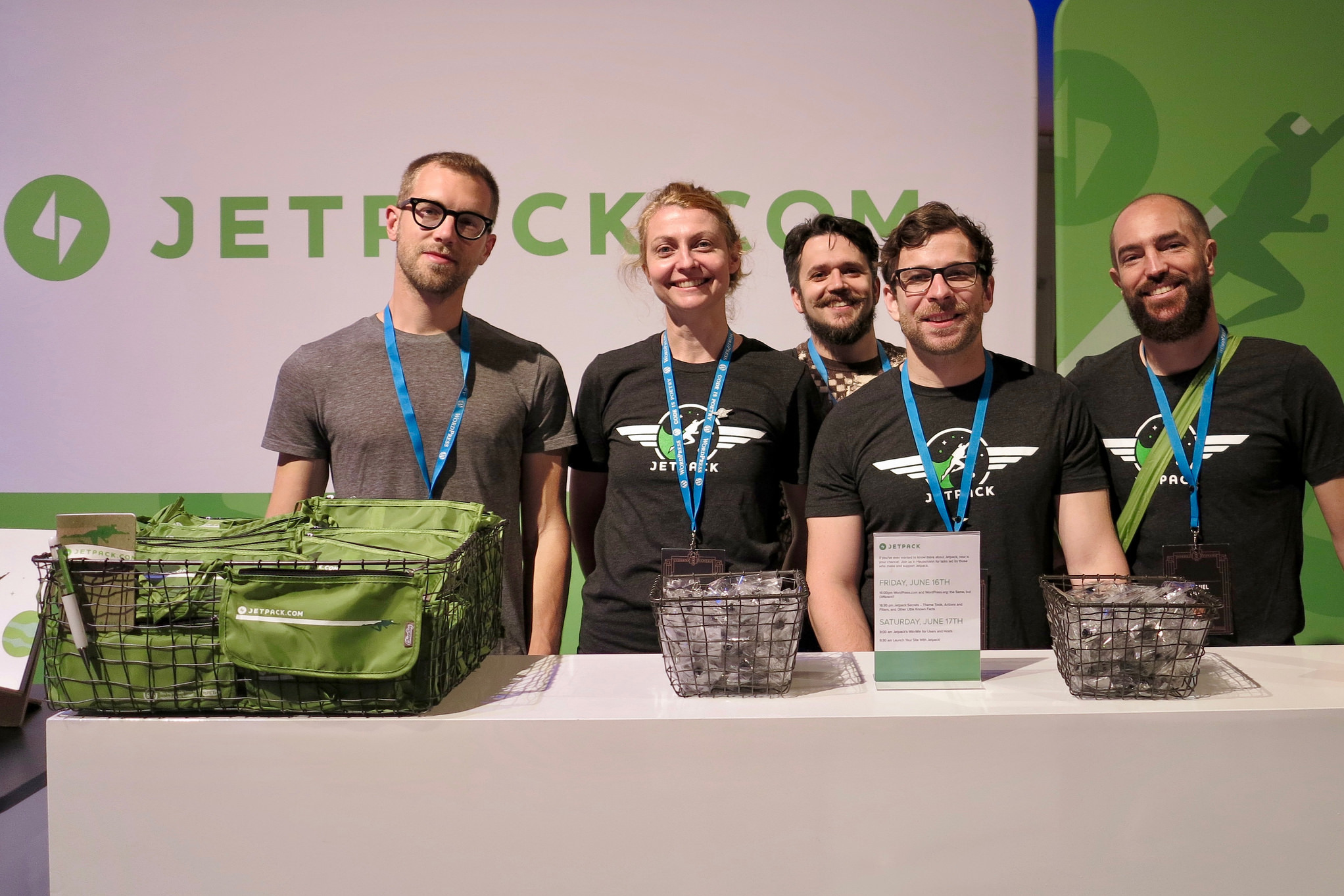 Jetpack Sponsor Table at WordCamp Europe 2017. Photo by Oliver Gobet (https://www.flickr.com/photos/gd6d/)