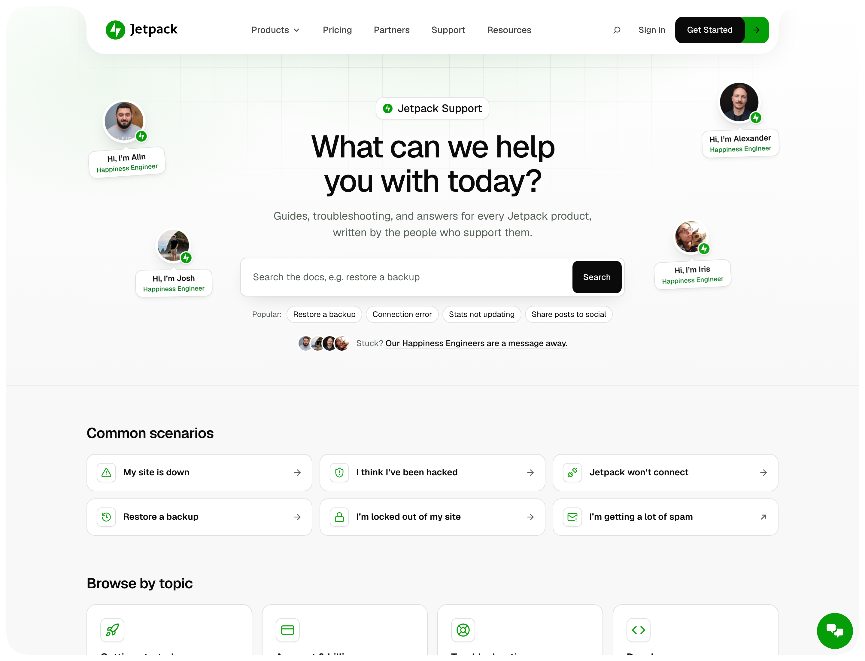 The new Jetpack support home, with search, popular searches, Happiness Engineers pictured around the heading, and "Common scenarios" cards.